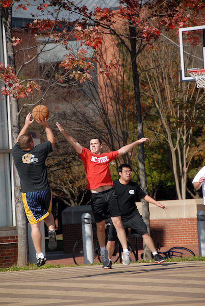 Students playing basketball