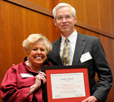 Photo of Dr. Douglas Reeves accepting award.